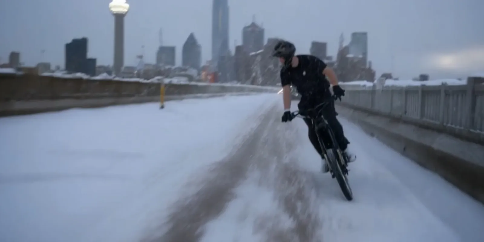 Runway Gen-3 AI-generated scene showing cyclist in snowy cityscape